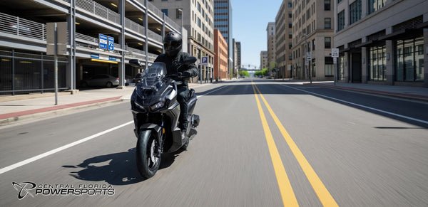 2027 Honda ADV160 in Matte Black Metallic - lifestyle riding scene
