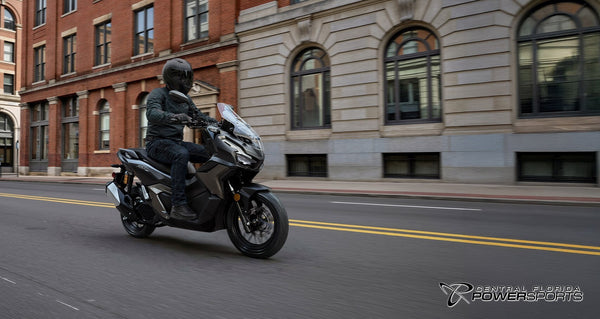 2027 Honda ADV160 in Matte Black Metallic - lifestyle scene