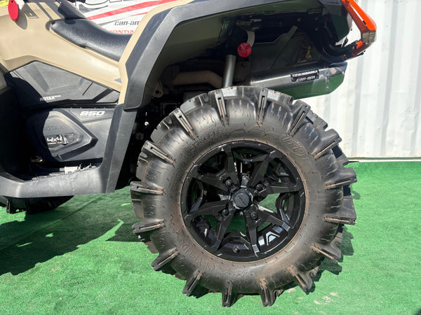 2023 Can-Am Outlander X MR 850 tan left rear wheel and mud tire