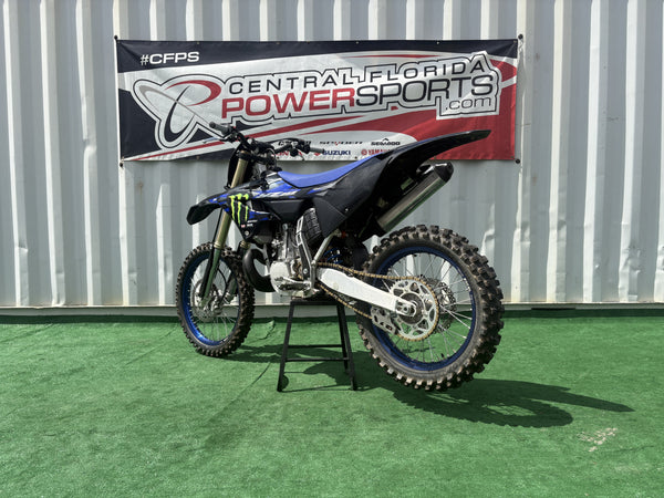2025 Yamaha YZ250 Monster Energy Edition in Blue, left rear three-quarter view, used dirt bike for sale at Central Florida PowerSports