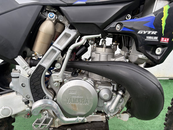 2025 Yamaha YZ250 Monster Energy Edition in Blue, right side of the 2-stroke engine and expansion chamber, used dirt bike for sale at Central Florida PowerSports