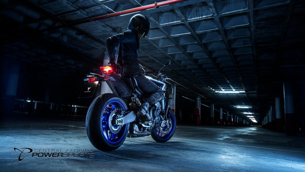 2026 Yamaha MT-09 SP, rear three-quarter view in a lit parking structure