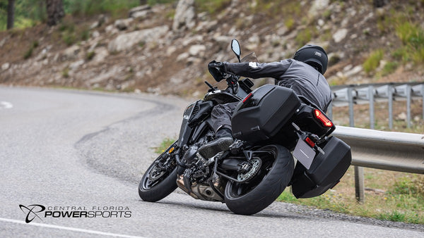 Rider leaning a 2026 Yamaha Tracer 9 through a paved bend