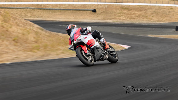 Rider cornering a 2026 Yamaha YZF-R9 70th Anniversary Edition on a closed racetrack