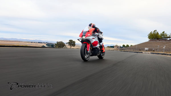 Rider approaching on a 2026 Yamaha YZF-R9 70th Anniversary Edition at a racetrack