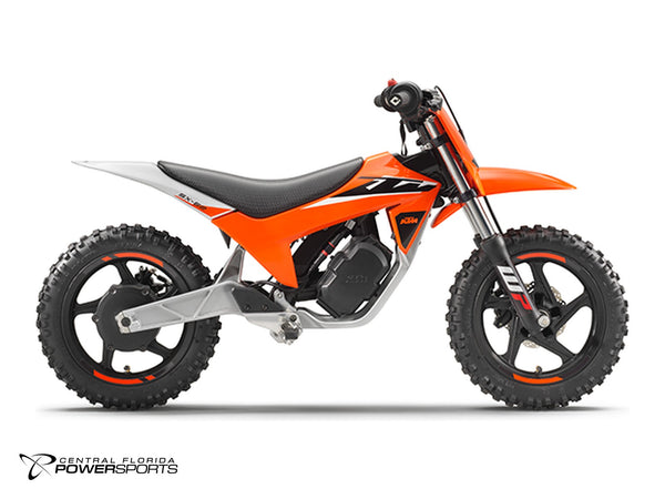 2027 KTM SX-E 2 in Orange - side profile studio photo, facing right