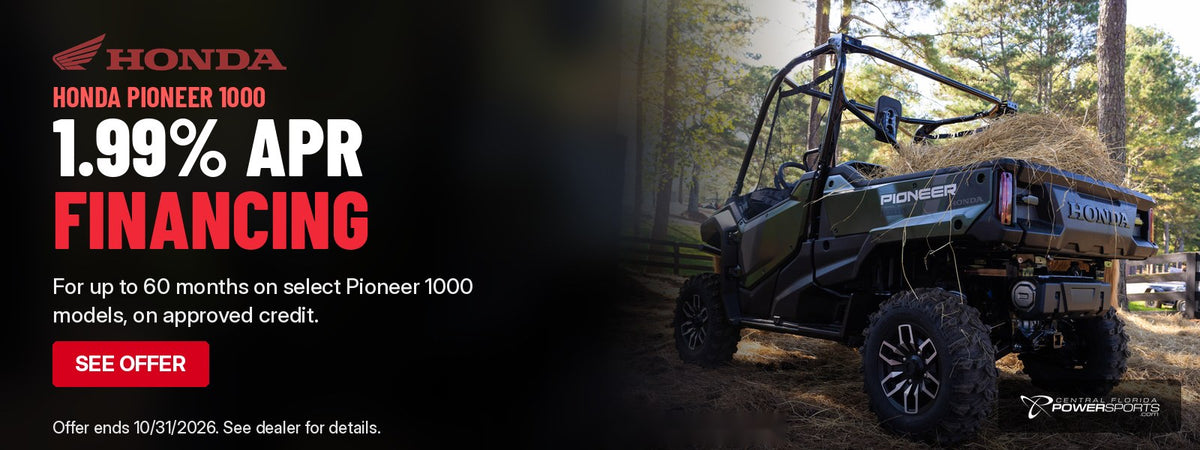 Honda Pioneer 1000 side-by-side loaded with hay on a farm: 1.99% APR financing for up to 60 months on select Pioneer 1000 models. Offer ends 10/31/2026.